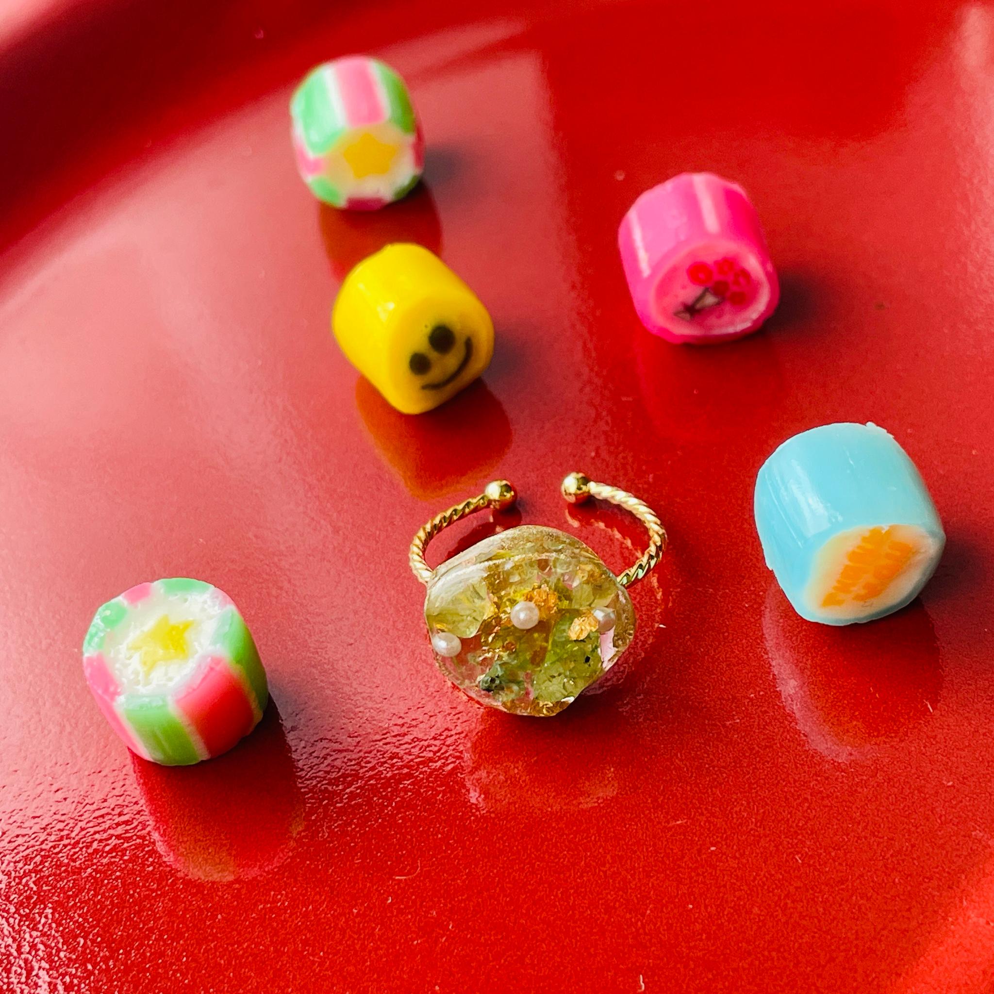 煌めくペリドットのハッピーオープンリング1枚目の画像