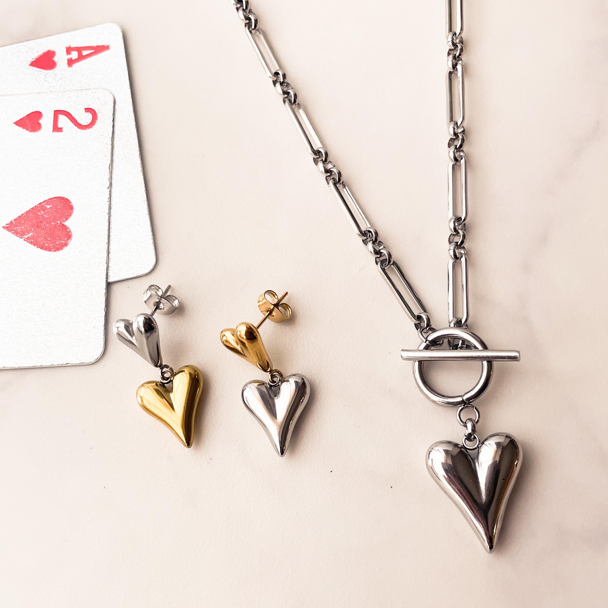 ゴールド×シルバーミックスカラーのクールなメタルダブルハートピアス | 14枚目